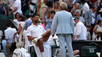 Kirsty Wigglesworth - Novak Djokovic gets in heated argument with Wimbledon official over roof during thrilling quarterfinal win - foxnews.com - Serbia - Canada