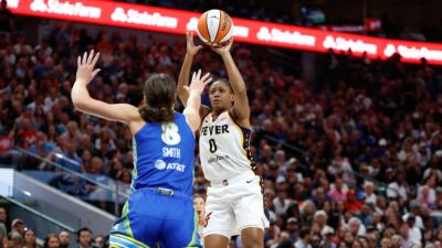 Fever's Mitchell sets WNBA record for consecutive 20-point games - ESPN