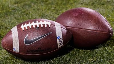 Judge says injunction doesn't cover football players who signed pro deals - ESPN