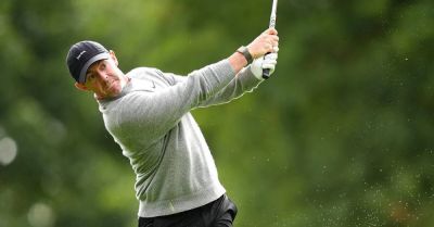 Rory McIlroy falters after strong start as Aaron Rai leads at Wentworth