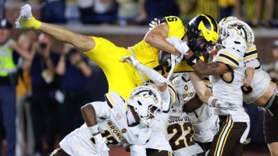 Michigan wins on second-chance Hail Mary; Big Ten stands by review - ESPN - espn.com - Usa - state Michigan
