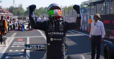 Kimi Antonelli reels in George Russell to win Italian GP from back row of grid
