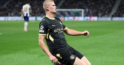 Erling Haaland double sees Manchester City to fiery win in Porto rain